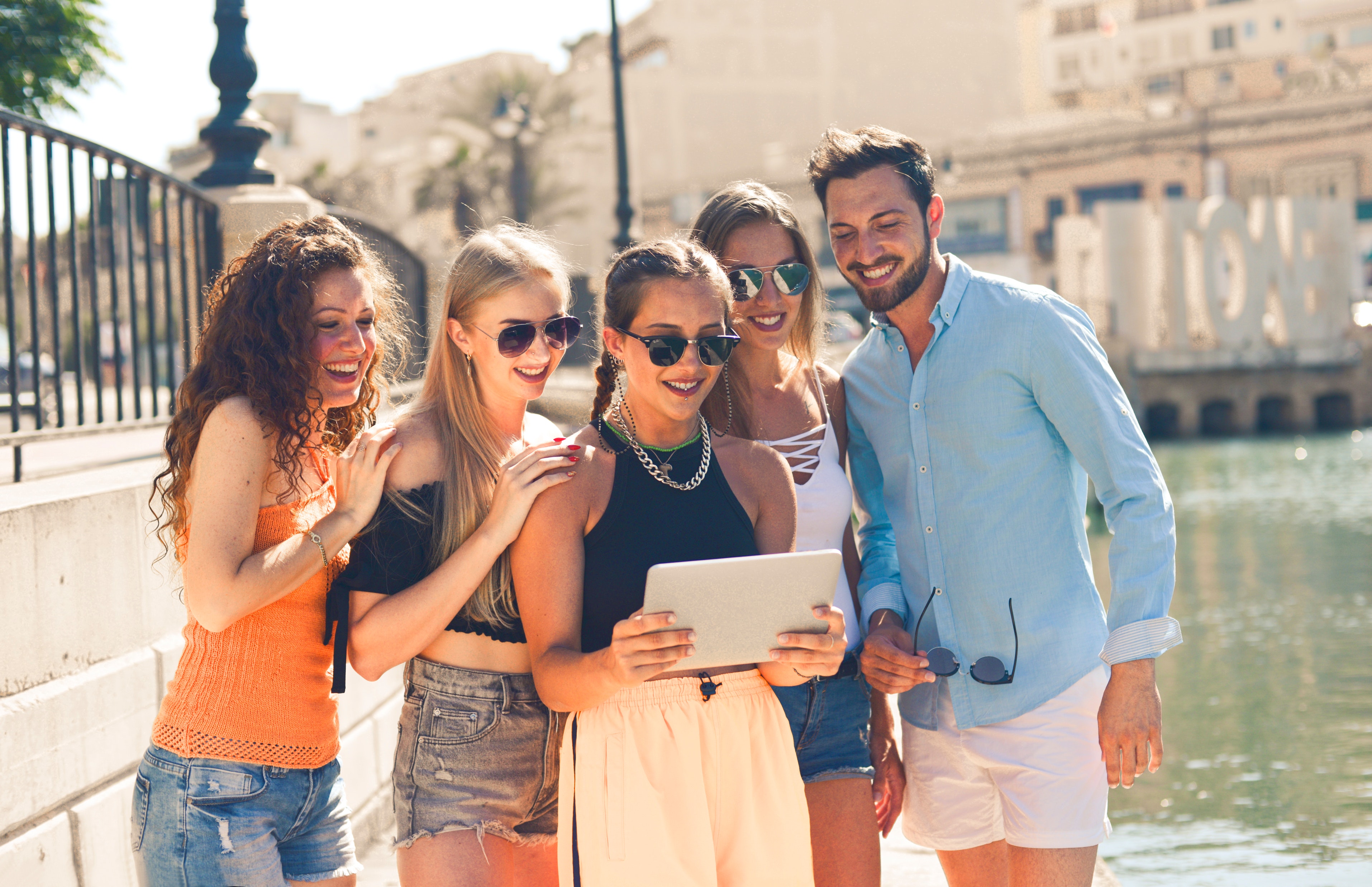 group-of-people-standing-beside-body-of-water-2672979.jpg