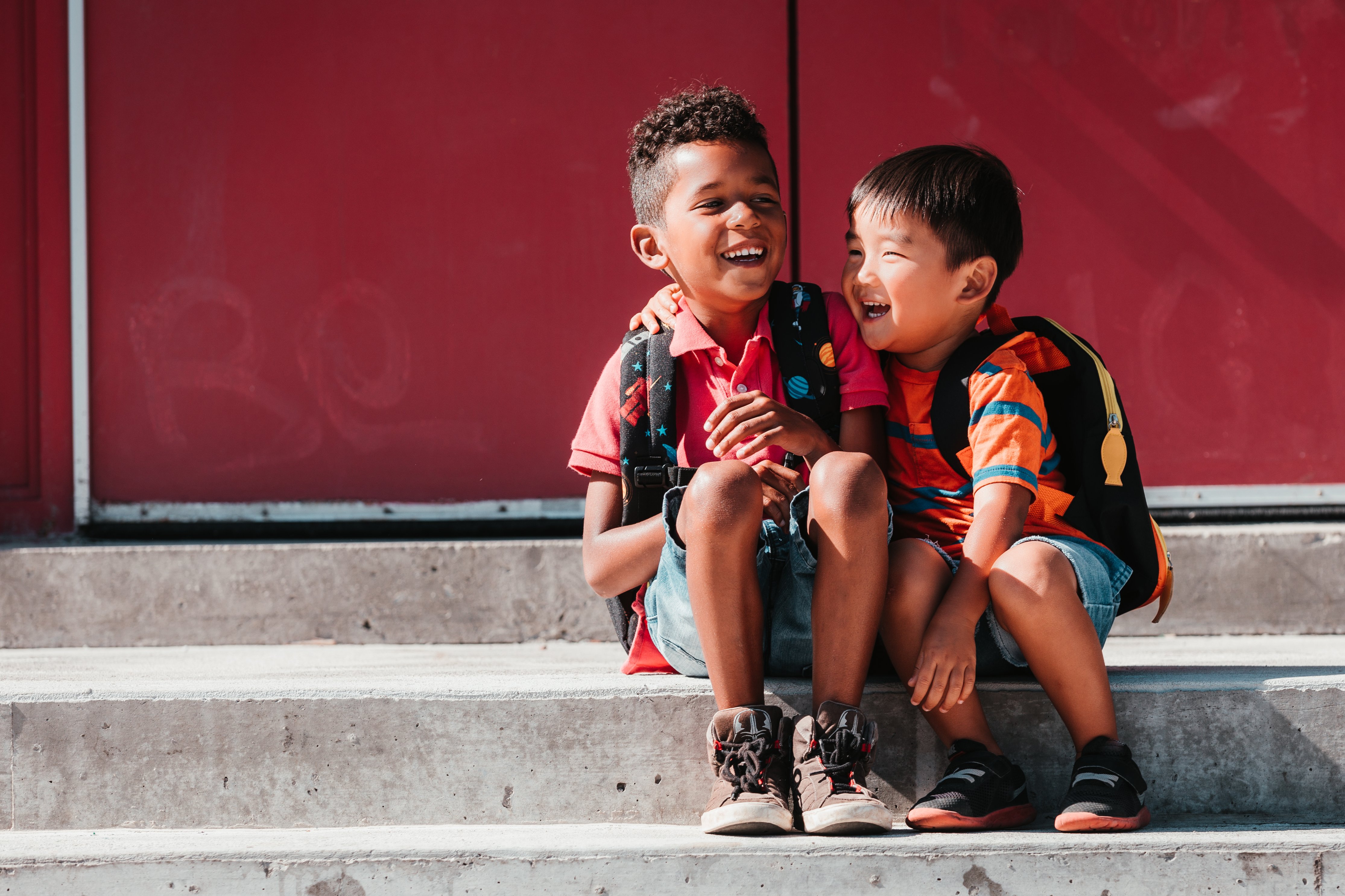 kids-giggle-on-steps.jpg